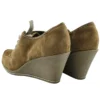 Back view of vintage suede wedge shoes showcasing their retro silhouette and craftsmanship