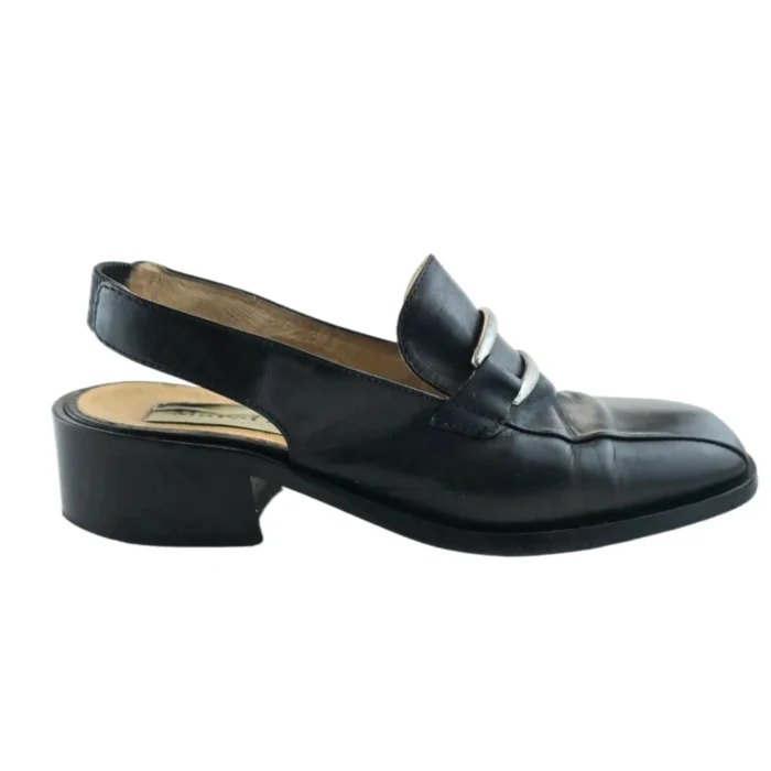 Side view of Vintage Marc O'Polo black leather slingback loafers, featuring a silver-tone metal detail and block heel.
