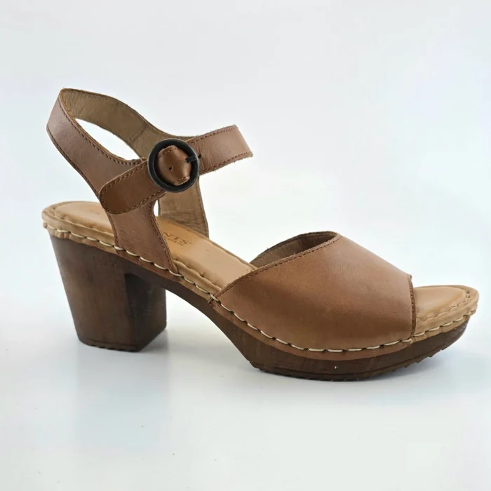 Side view of vintage brown leather sandals with wooden heel and black buckle strap