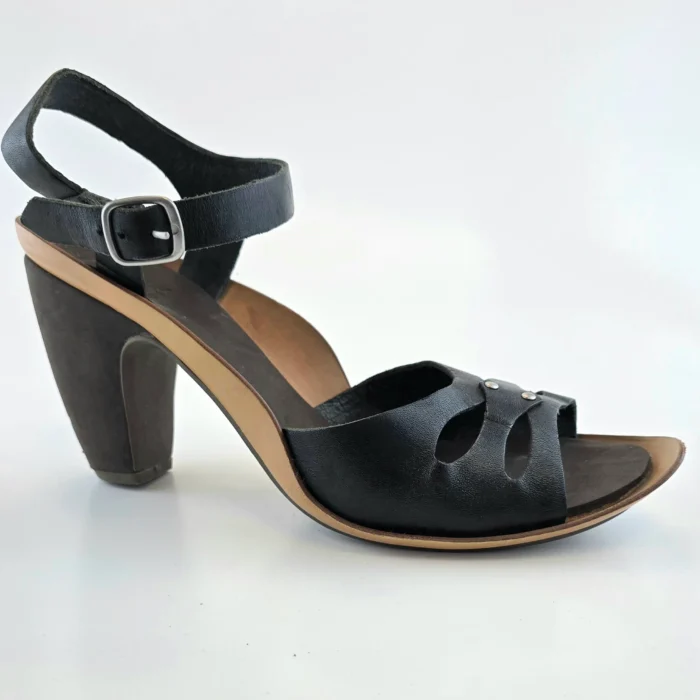Side view of a Vintage Shoes Camper black leather sandal with a sculpted heel
