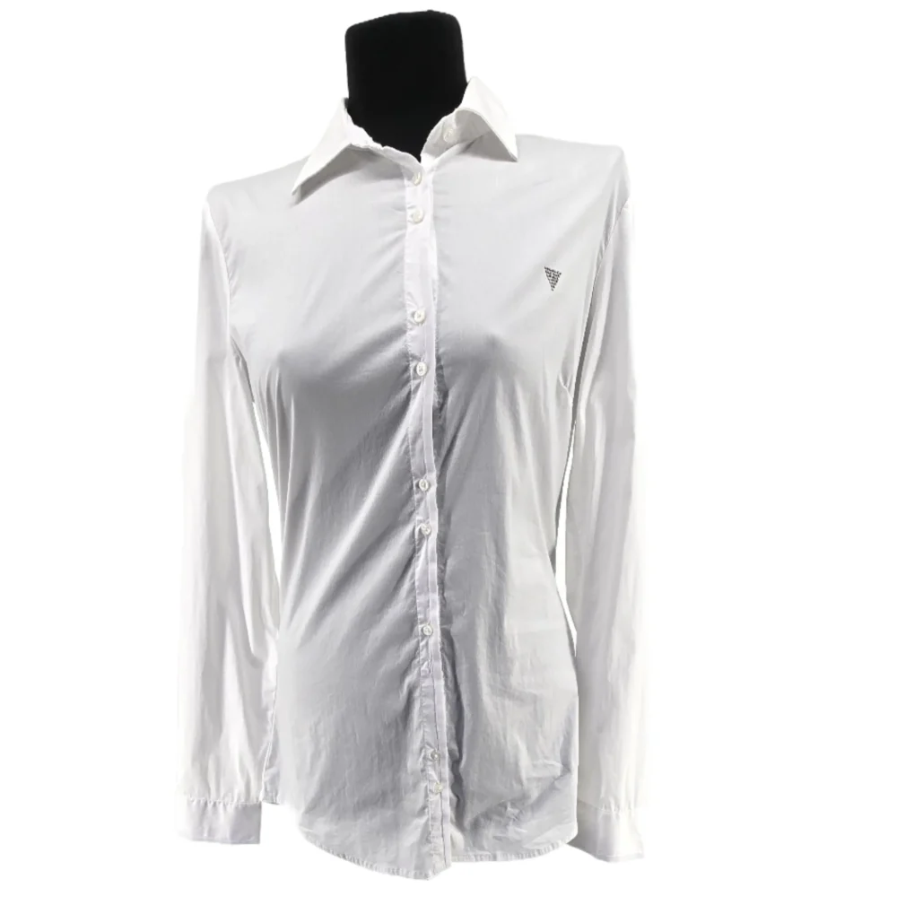 Front view of a white fitted vintage Guess shirt with long sleeves and button closure