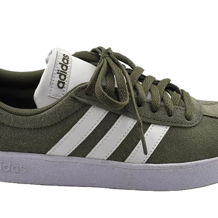 Olive green suede vintage Adidas sneakers with white stripes – side view