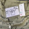 Vintage Italy Moda Damenbluse grün schwarzer Schriftzug-Print Retro-Stil Viskose